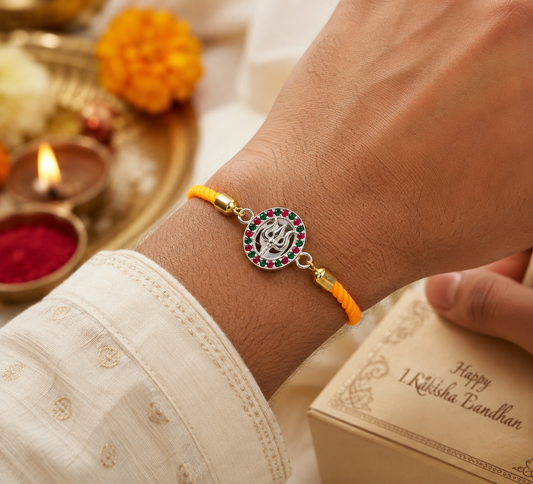 Silver Trishul Rakhi with Ruby & Emerald Stones